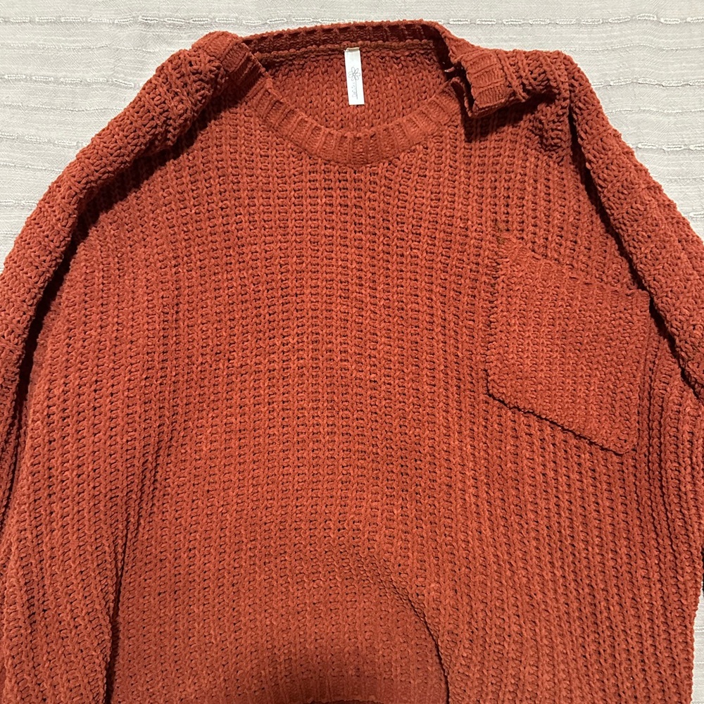 Orange knit sweater
